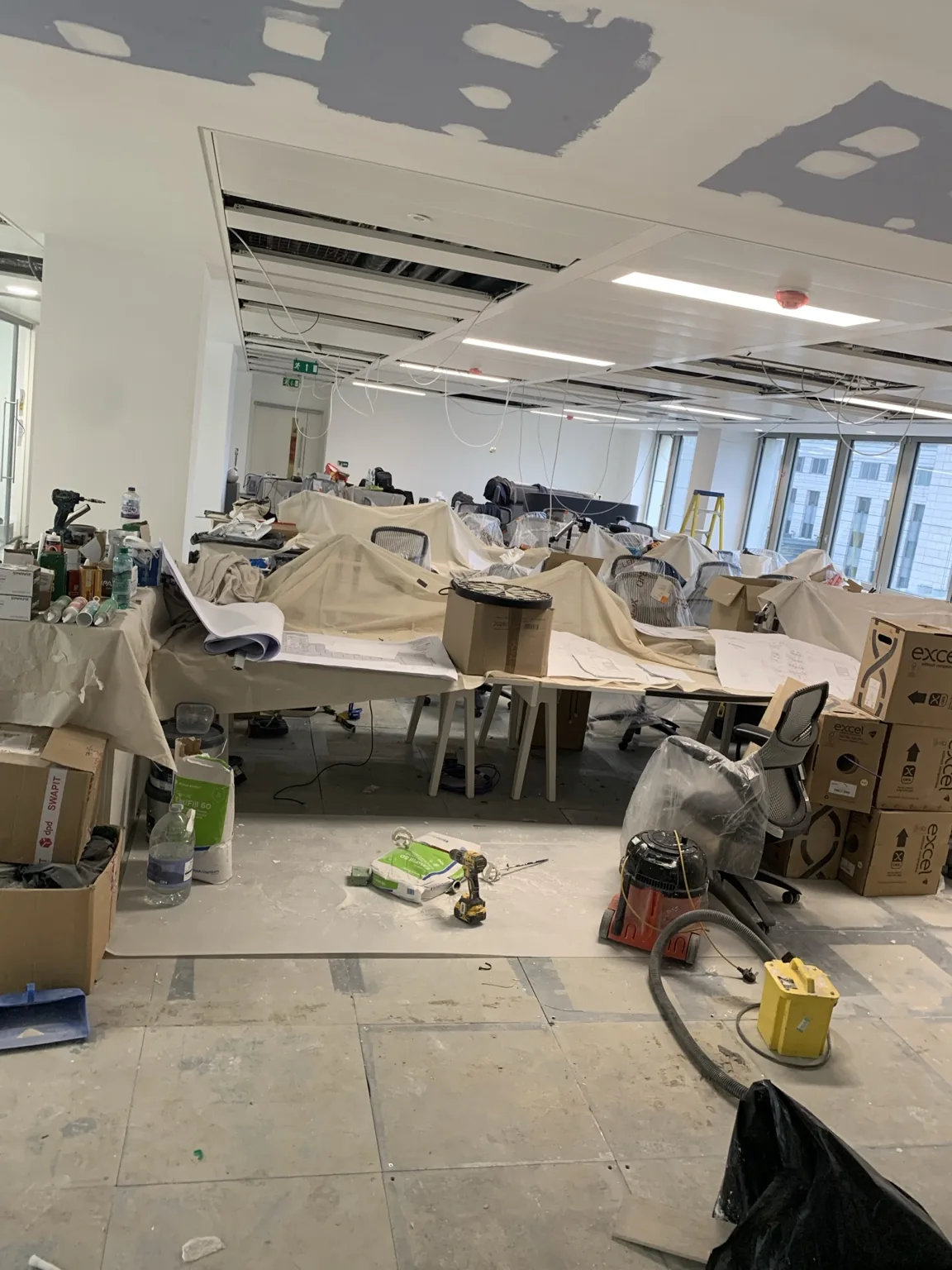 Bain office fit-out around retained furniture